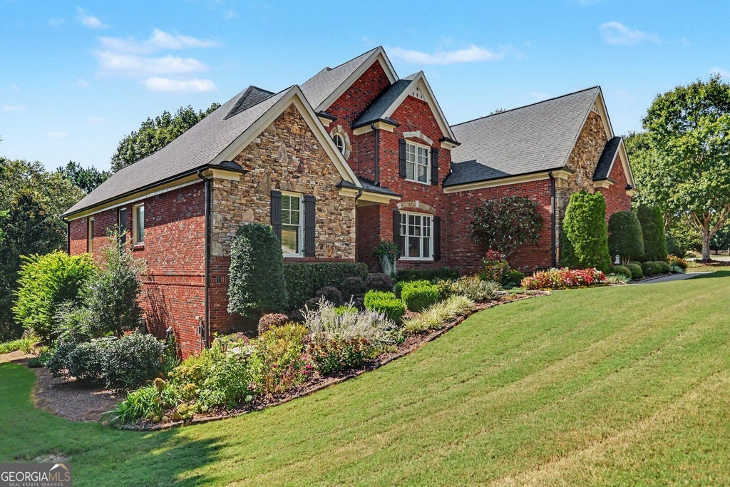 Photo of 4638 Cardinal Ridge Way, Flowery Branch, GA 30542 (MLS # 10839358)