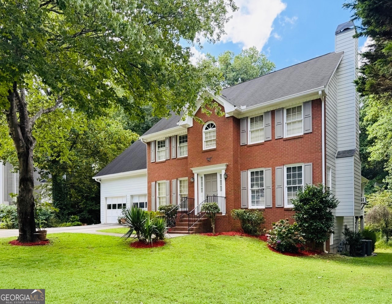 Move In Ready! Beautifully Updated Brick Front Home with partial finished Basement/lots of potential for extra bedrooms, bath addition, movie theater or more. Walk to Downtown Roswell! (approximately 1.4 miles/6min walk) Discover the perfect combination of comfort, space, and location in this beautifully updated brick front home with low-maintenance concrete siding and a spacious basement. Nestled on a level lot in one of Roswell's most coveted school districts, this home offers fresh updates throughout and a flexible floor plan that fits every stage of life. The private, backyard is ideal for gardening, outdoor entertaining, or even adding a future pool - the possibilities are endless. The oversized garage provides ample storage space for tools, hobbies, or a workshop, and the additional concrete pad offers extra parking for guests or a third vehicle. Inside, you'll enjoy generous living areas, natural light, and room to grow - with square footage from the survey and sellers reflecting a larger layout than tax records indicate. Whether you're hosting on the sun porch or enjoying a quiet evening in, this home provides the lifestyle you've been waiting for. Located just a short walk from charming downtown Roswell, you'll have easy access to local favorites for shopping, dining, festivals, and community events. Many Parks, trails, recreation minutes away and top-rated schools and restaurants are all within minutes. Don't miss your chance to own a beautiful, move-in ready home in one of North Atlanta's most desirable communities with No HOA!