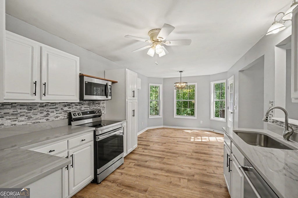 Photo of 402 Eileen Circle, Canton, GA 30114 (MLS # 10872766)