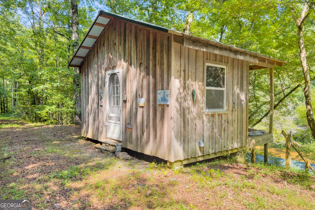 Photo of 0 Waters Edge Trail, Talking Rock, GA 30175 (MLS # 10826731)