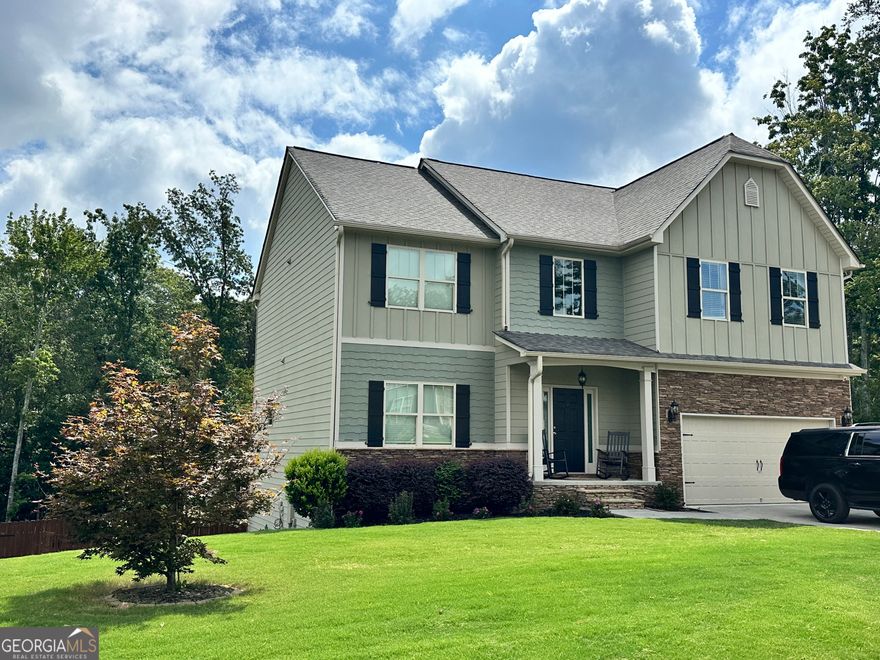 Welcome home to 36 Thunderhawk Lane in the sought after Foothills at Rydal. This better-than-new home is nestled at the end of a quiet cul-de-sac and features a grand 20 foot foyer, private backyard with shed and hot tub, and a fully finished basement with an office/flex space and apartment. Upstairs, you'll find a spacious primary suite with a private bath, along with three guest bedrooms with brand new carpet, a full bath, and a conveniently located laundry room. The main level features an open concept kitchen and living room, which overlooks the beautiful and private large fenced-in backyard. Step outside to enjoy the covered deck, poured concrete patio, and your very own hot tub oasis-perfect for year-round relaxation. A large shed with electricity and dual lofts adds incredible storage or workshop potential. The fully finished basement expands your living space with a versatile office/flex area and a complete in-law suite/apartment- ideal for multigenerational living, entertaining, or simply enjoying peaceful everyday life. With ample parking, incredible outdoor amenities, and thoughtful upgrades throughout, this home checks every box. Don't miss your chance to own this exceptional property-schedule your private tour today!    The listing agent has a financial interest in this property.