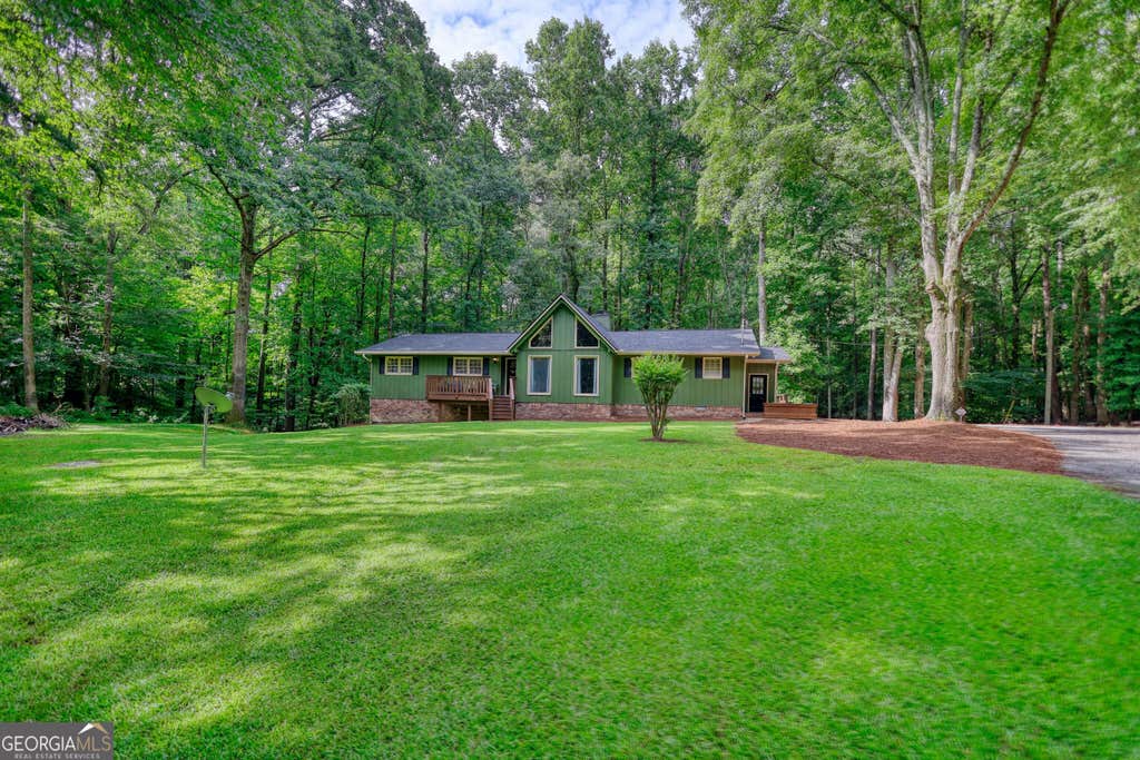 Photo of 5090 Donald Drive, Loganville, GA 30052 (MLS # 10823150)