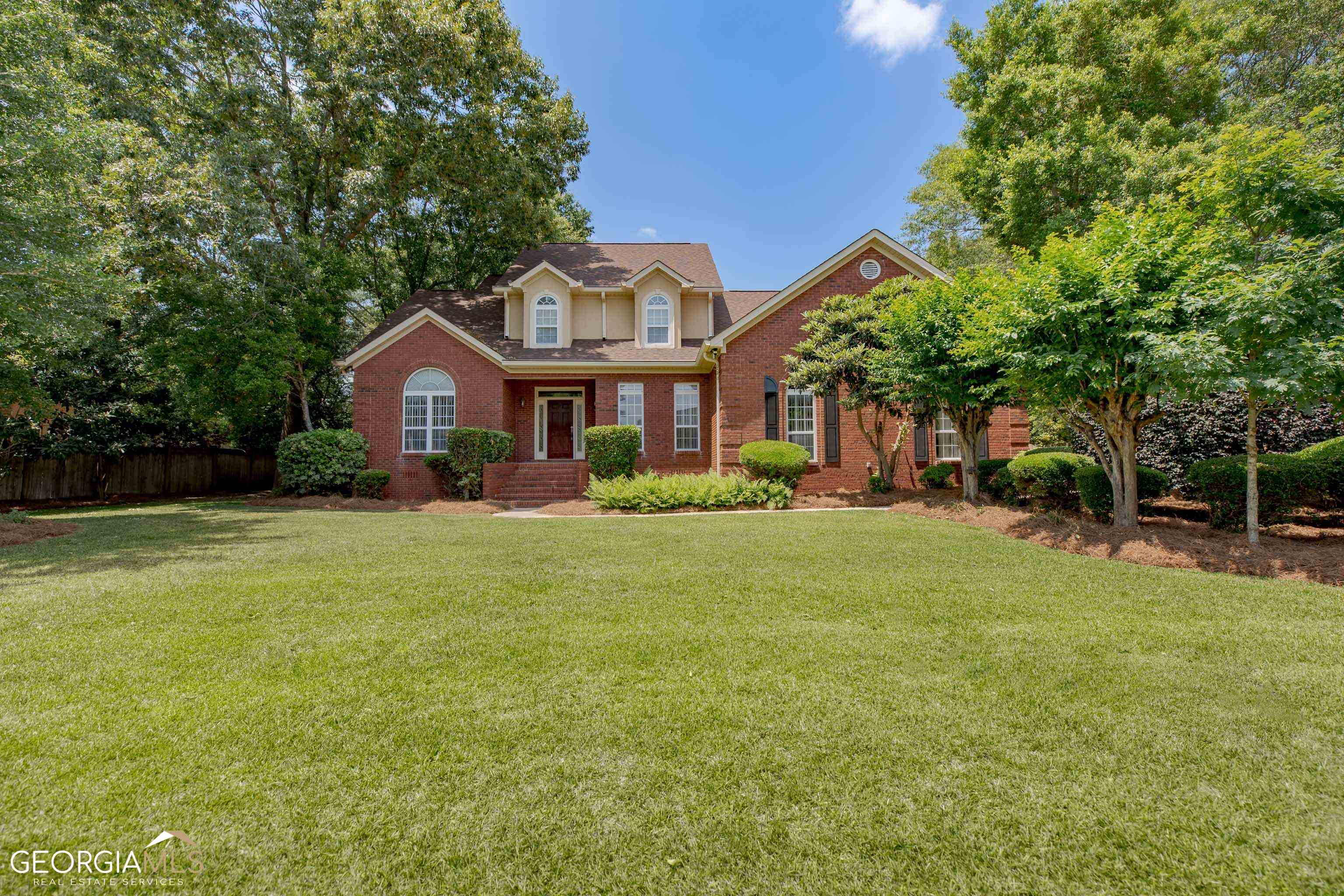 Buyer's Financing Fell Through! Stunning all-brick home situated in the highly sought-after Brantley Subdivision. The kitchen was tastefully remodeled in 2016 and features exquisite granite countertops, an in-wall oven, a convenient breakfast bar, and a cozy breakfast nook. Adjacent to the kitchen, you'll find a formal dining room, perfect for hosting dinner parties or enjoying family meals. Additionally, there is an office/study, providing a dedicated space for work or relaxation. The spacious living room is adorned with elegant French doors that lead out to a beautiful sunroom, offering a tranquil retreat for relaxation or entertainment. The master bedroom, conveniently located on the main floor, boasts a generous walk-in closet as well as an en-suite bathroom. The master bathroom includes a double vanity, separate shower, and a luxurious garden tub, creating a perfect oasis for unwinding after a long day. Hardwood floors adorn the foyer, formal dining room, living room, and master bedroom, adding warmth and sophistication to the home's overall ambiance. Upstairs, you'll find three additional bedrooms, each offering ample space and versatility to suit individual needs. You can enjoy the convenience of walking out from the sunroom to a breathtakingly landscaped backyard. As you step outside, you'll be greeted by a stunning in-ground pool, surrounded by vibrant flower beds and a well-maintained garden. Additionally, there is a fully wired detached two-car garage, providing you with plenty of space for parking and storage. n summary, this stunning all-brick home in the Brantley Subdivision offers a plethora of desirable features, from the remodeled kitchen with granite countertops to the luxurious master suite. With its spacious layout, and convenient location, this property truly has it all. Don't miss the opportunity to make this house your dream home.