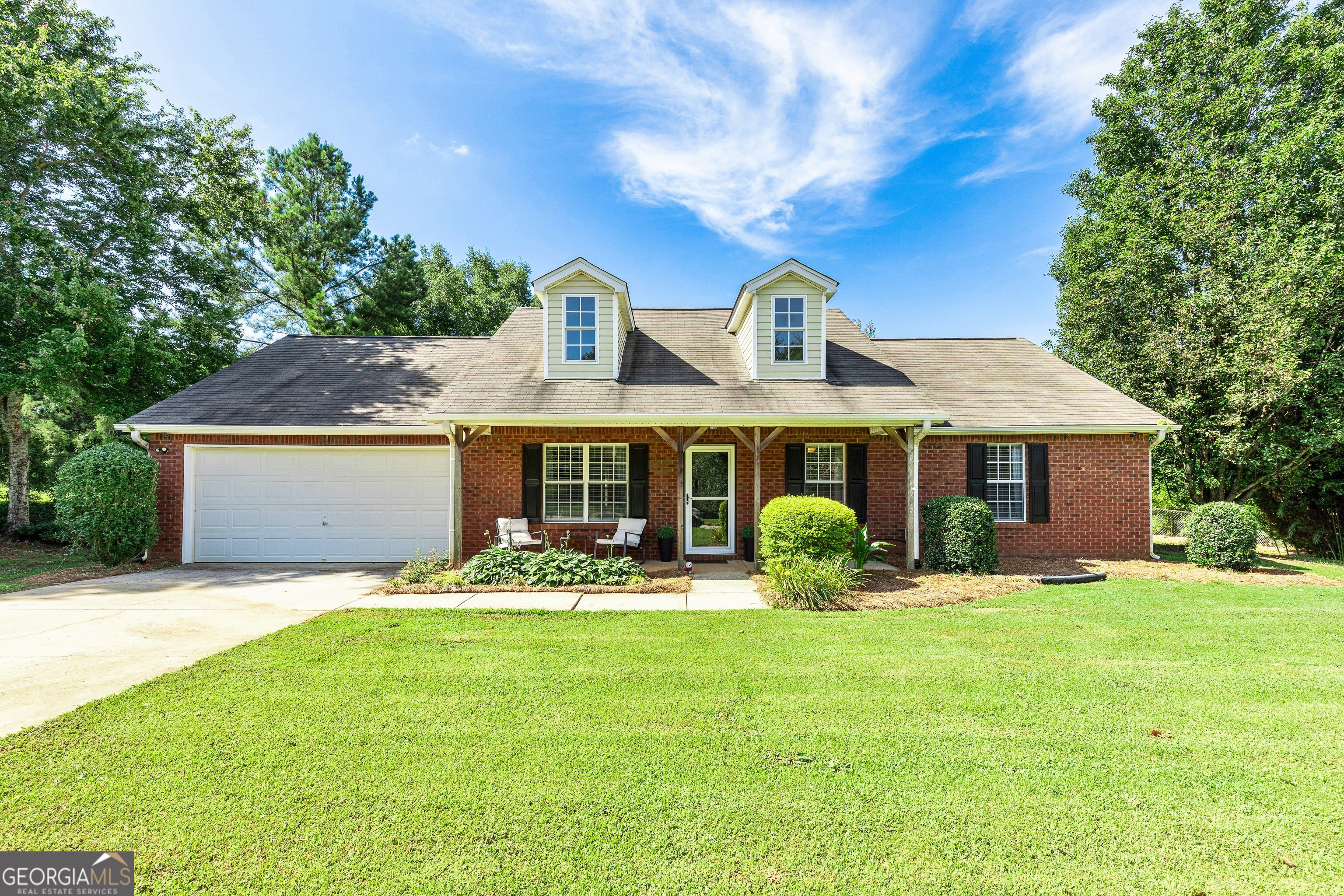 Adorable Brick front RANCH. Front and Back Covered Porches. Step inside this amazing 3 bedrooms, 2 bathrooms home and feel how cozy it is with this inviting floor plan. This home is the perfect place for the first time buyer or a couple ready to downsize. It's all one level with a private back yard. Sidewalk and street light community. Large living room with fireplace open to dining area. Nice size kitchen where you'll find stainless steel appliances, a laundry room off to the side. Dining area has sliding back doors overlooking the amazing large fenced in backyard that's perfect for grilling and entertaining. Master suite has a gorgeous tiled walk-in shower. Two nicely sized spare bedrooms and a guest bath. OLA SCHOOLS!!!