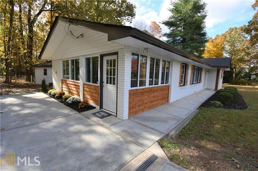 BRICK RANCH on 3/4 Acre - NO HOA. Bright Open Floor Plan with many windows. Complete Renovation with farmhouse charm - Shiplap, Barn Door, Real Hardwood Floors, Cedar Posts & Shutters. Kitchen features White Cabinets, Granite Counters, Island Bar & S/S Appliances. Home is Move in Ready with New Roof, HVAC, Flooring, Kitchen, Bath, Interior & Exterior Paint. Total Level Lot offers tons of space to park Boats, RV's or other toys. Private backyard with Fire-Pit & Workshp/She-Shed with Power.  Must see!