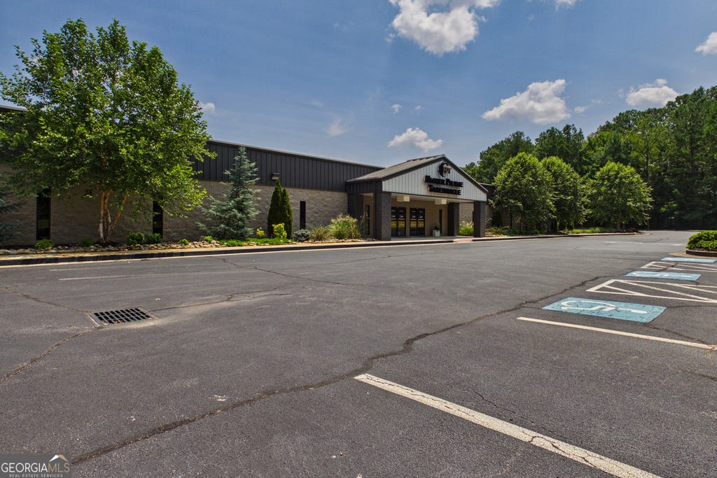 Photo of 3915 Highway 162, Covington, GA 30016 (MLS # 10819293)