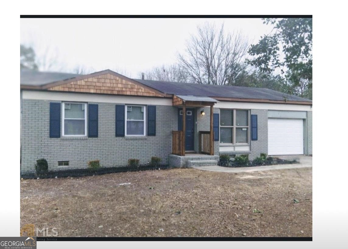 Laminated flooring, Tiled kitchen 3 bedroom , 1 bathroom renovated home featuring a 1 car garage. If you are looking to expand your real estate portfolio or if you are looking to purchase your next home this home is turnkey and ready.