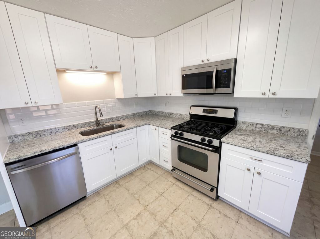 Photo of 1355 Fern Hill Drive, Lawrenceville, GA 30044 (MLS # 10689119)