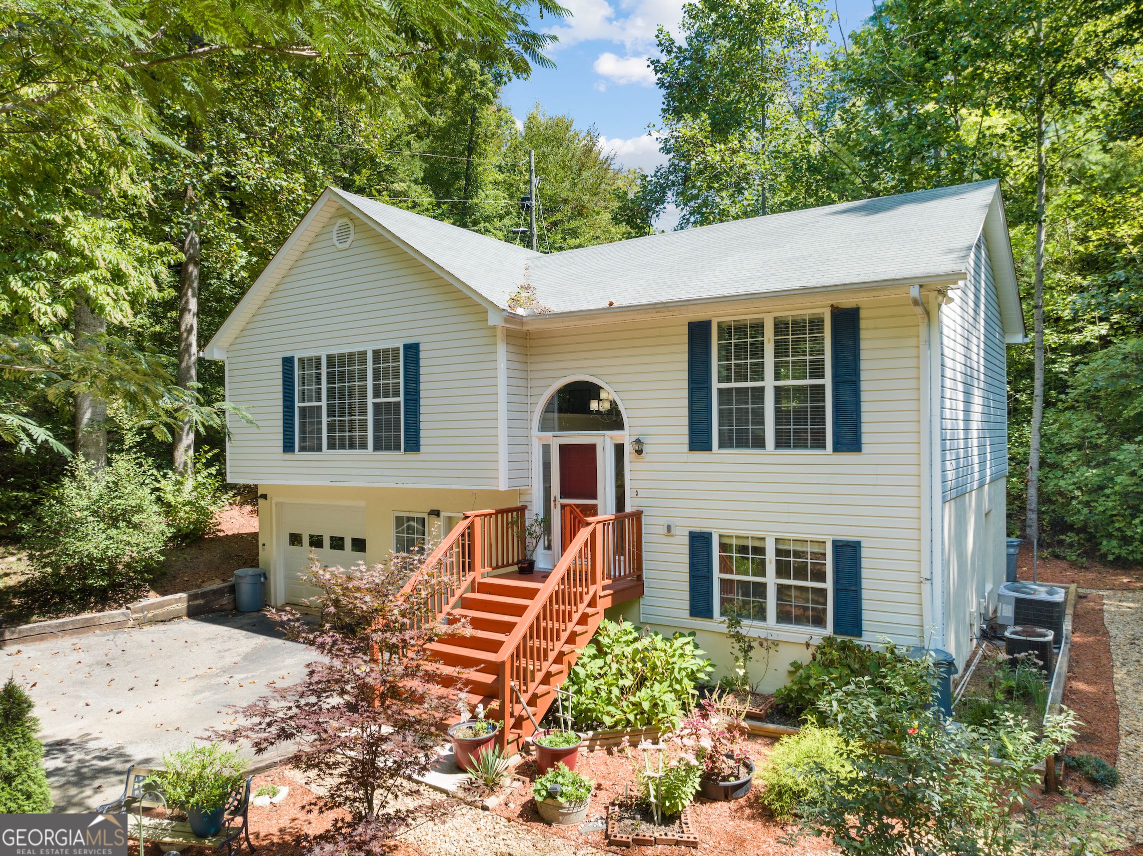 Nestled among the trees with valley views, usable flat land and almost 700 ft of Stekoa Creek Frontage. Newly updated kitchen with stainless steel appliances, honed granite countertops and subway tile backsplash. Wood and tile floors throughout. Newly painted interior. Attached Garage with plenty of space to add additional garage or storage. Wood burning fireplace in bonus room downstairs. Excellent WIFI, high speed internet and TV. This home is excellent for vacation or full time. NO HOA.