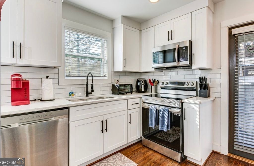 Photo of 2235 Baker Road NW, Atlanta, GA 30318 (MLS # 10725422)