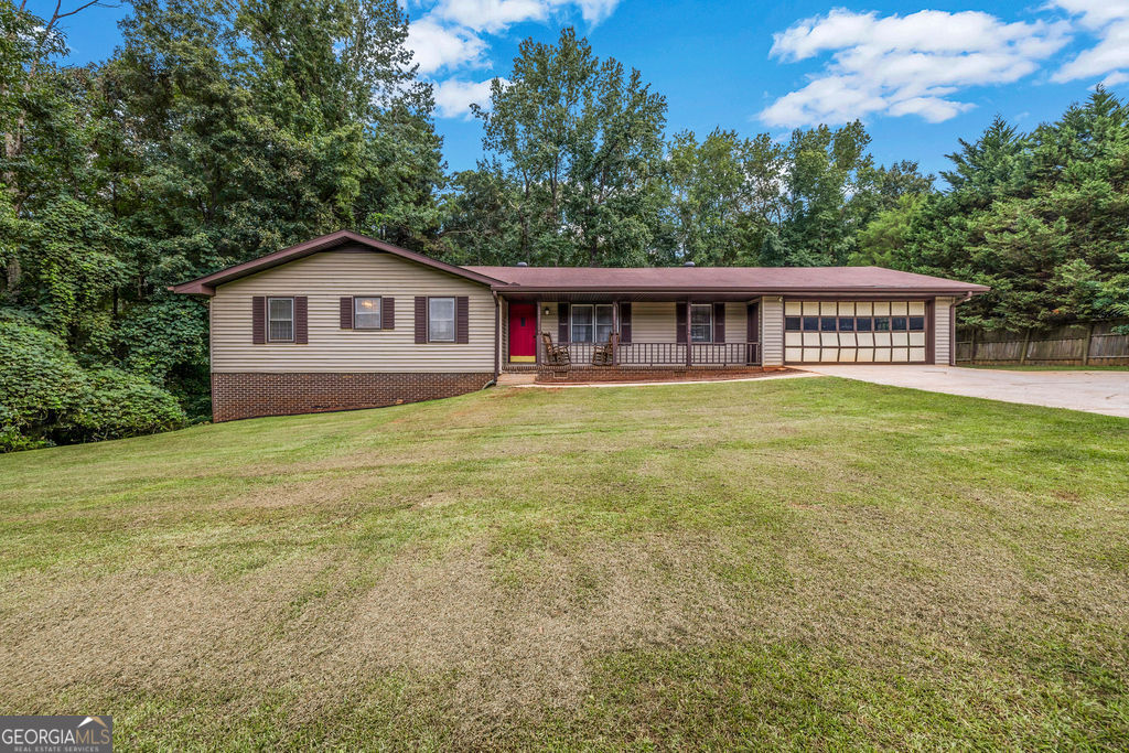 Playful & Personality-Packed 3BR/2BA Ranch with Quirky Charm and Room to Play Why settle for cookie-cutter when you can have character? This updated ranch serves up an inviting mix of hardwood and tile floors, an on-trend kitchen and bathrooms, plus a partial basement waiting for your creative touch. Host game nights or backyard barbecues on the spacious deck overlooking a big, level yard-plenty of space for cornhole or a hammock under the stars. Two-car garage? Check. PickiVicki Approved? Double-check. Special financing is available with preferred lenders, so bring your imagination and make this one your happily-ever-after! **OWNER OCCUPIED WITH ALARM. NEED Appt to show.