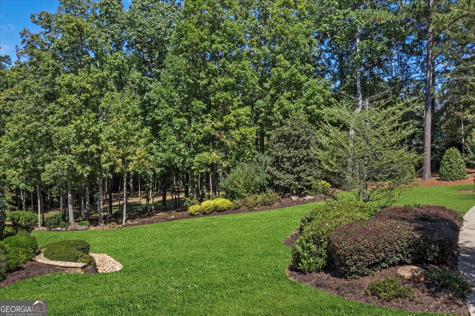 VERY RARE LARGE ALMOST ONE ACRE GOLF COURSE LOT IN THE HIGHLY DESIRABLE AND THE ONLY COBB COUNTY MANNED 24/7 GATED COUNTRY CLUB GOLF COMMMUNITY-- LOCATED ON #13 AND ON A SECLUDED ENCLAVE STREET WITH AN ADDED AND RARE ALSO 1.36 ACRE GREEN SPACE PARK AREA ON THE FRONT OF THE CUL-DE-SAC WITH WALKING TRAILS/MULTI-MILLION DOLLAR HOMES IN THIS ENCLAVE OF 4 HOMES AND THE ONLY LOT AVAILABLE HERE/LARGE BEAUTIFUL OPEN AREAS ON THIS PROPERTY WILL MAKE IT EASY TO BUILD INCLUDING A POOL IF DESIRED/VERY EASY ACCESS TO WALK TO THE POOL & WATERSLIDE AREA/LIGHTED TENNIS COURTS AND PAVILION/SOFTBALL FIELD/BASKETBALL COURT & PLAYGROUND TOO/BEAUTIFUL LIKE NEW CLUBHOUSE W/CLUB BAR & ELEGANT RESTAURANT AREAS/MEN'S GRILL/LOCKER ROOMS/PRIVATE EVENT AREAS/EUROPEAN SPA/EXERCISE FACILITY/THIS IS AN AMAZING COMMUNITY OF VERY ELEGANT CUSTOM BUILT HOMES-RARE AS WELL TO COBB COUNTY/CLOSE TO SHOPPING/SCHOOLS/RESTAURANTS/25 MINUTES TO COBB COUNTY INTERNATIONAL AIRPORT/EASY DRIVE TO THE BRAVES STADIUM/RESTAURANTS/HOTEL COMPLEX AREA IN VININGS/CLOSE TO LAKEPOINT SPORTS CENTER AND LAKE ALLATOONA TOO! THERE ARE BUILDERS AVAILABLE TO WORK WITH YOU IF NEEDED! THERE IS A MANDATORY $30,000 COUNTRY CLUB ATHLETIC MEMBERSHIP FEE DUE AT CLOSING THAT IS INCLUDED IN THE LIST PRICE!