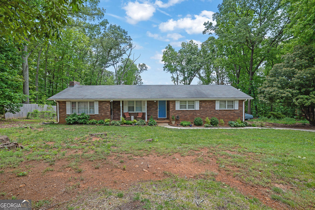 Charming 3-Bed, 2-Bath Home in a Desirable School District - Priced to Sell! Don't miss this opportunity to own a spacious 3-bedroom, 2-bath home located in one of the area's most sought-after school districts. This property features a partially finished walkout basement with a generous full bath that includes a jetted tub and a walk-in shower - ideal for extended living space or future in-law suite. The lower level also includes a large bedroom and has potential for a kitchen, just waiting for your finishing touches. Additional highlights:Roof will be repaired and replaced prior to closing...Priced below comparable homes in the neighborhood...Incredible value with tons of upside...A must-see for investors or buyers looking for sweat equity! Bring your vision and make this house your home!