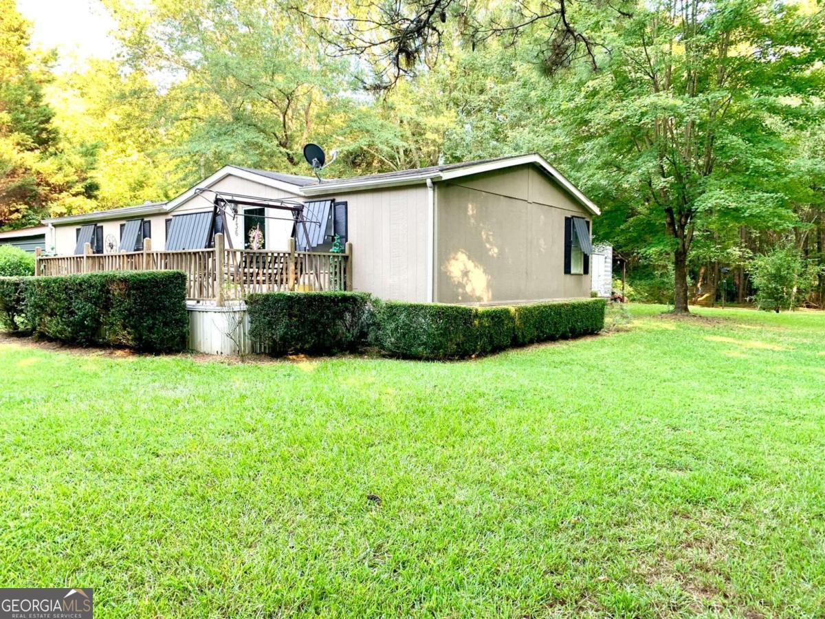 Photo 2 of 40 of 736 Archer Grove School RD mobile home