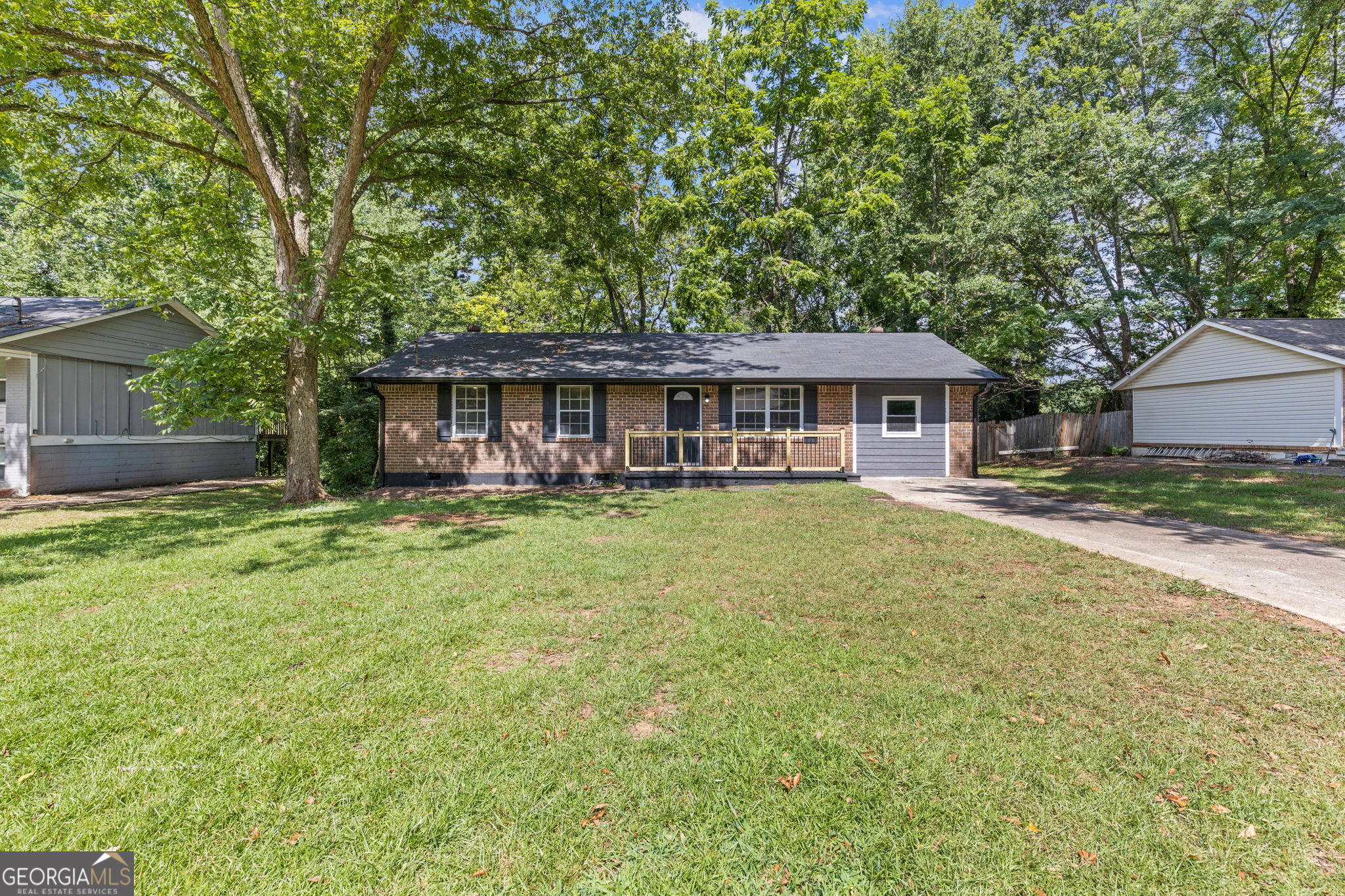 Fully remodeled with four bedrooms and two full bathrooms at the ranch on 8221 Queens. This four sided brick ranch is all brand new and sits on a level front and backyard! Walk to your front door with a new wood and wrought iron-esque railing. The spacious kitchen is fully remodeled and has stainless steel appliances. Behind the kitchen is your separate laundry room. Four bedrooms and two full bathrooms, of which are all luxury vinyl plank- NO CARPET in this home! A list of contractor updates include: NEW AC with cage, NEW water heater, all new interior paint, kitchen granite countertops and appliances, new gutters, all new light fixtures and fans, new flooring, new vanities in baths, and updated front porch and back patio. Make an appointment today and let's put your LAST name on this FRONT door!