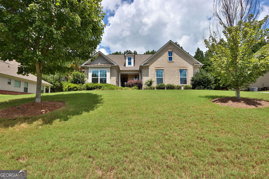 Welcome home to this stunning ranch-style home! This beautiful house features a chef's kitchen with stained cabinets, granite countertops, an island with a breakfast bar, and a dining area. The kitchen overlooks a cozy family room with a gas fireplace. The master suite is tucked away towards the back of the house for added privacy. Two secondary bedrooms share a Jack and Jill bathroom. The upper level boasts an additional bedroom and full bathroom, perfect for a teen suite, man cave, or entertainment space. A covered patio with lovely patio furniture remaining completes this Must-See home! River Springs offers a wide range of amenities for residents to enjoy, including a beautiful clubhouse and a swimming pool with a slide. Please Show and Sell!