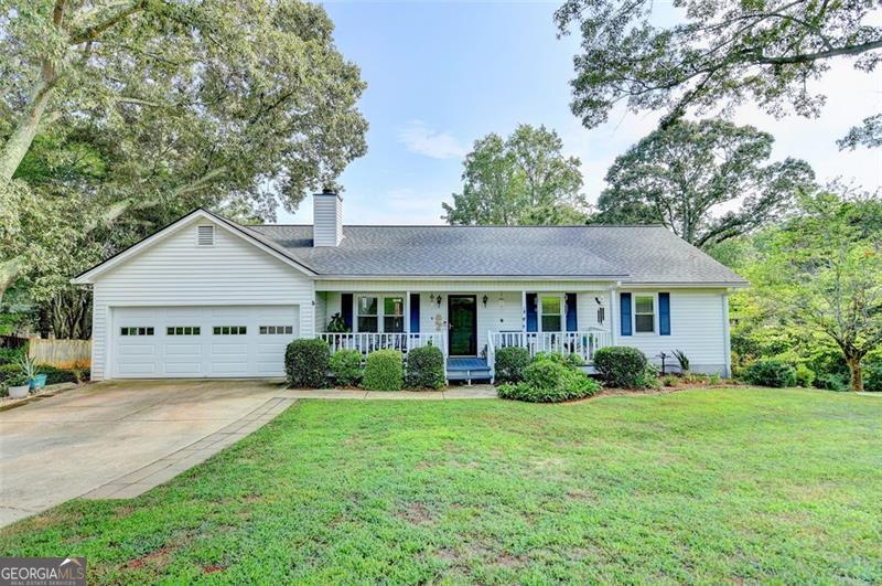 Welcome to this beautifully updated one-level ranch home nestled on a private, one-acre lot on Strickland Road. Featuring timeless hardwood floors and an abundance of natural light, this home offers both comfort and functionality. The updated kitchen boasts crisp white cabinetry, modern plank tile flooring, and ample counter space for easy entertaining. Both bathrooms have been thoughtfully renovated with stylish finishes. Downstairs, enjoy the flexibility of a fully finished basement-perfect for a second living area, home office, or guest retreat. Looking for homesteading with room for chickens and a garden? This spacious lot provides plenty of room to bring your vision to life, with space to plant, grow, and enjoy a more self-sustaining lifestyle. With a desirable single-level layout and peaceful surroundings, this property offers the best of relaxed living just minutes from modern conveniences.