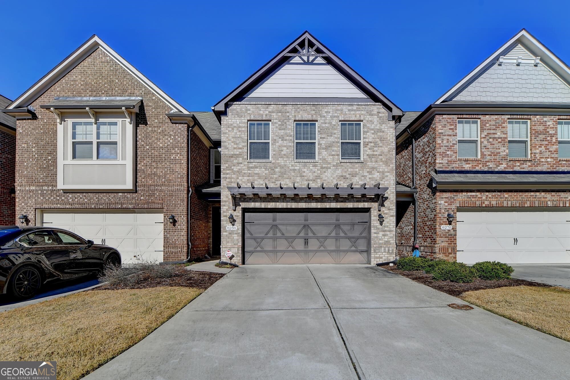 Luxury Gated Community with Pool in sought-after Suwanee/Forsyth County and Lambert School District. New Laminate Flooring on main. Open floor plan with great room open to Kitchen. The kitchen features stainless appliances including a new refrigerator. Granite countertops and tiled backsplash. Center Island, stained cabinets. Large Great room with Gas Fireplace. A screened Porch with added electrical outlets and overlooks the private rear yard. Large Master bedroom with tray ceiling and walk-in closet. Master Bath with tiled flooring and tiled shower, garden tub with tile surround, and double vanities. Hoa covers Gate, Pool, Exterior Maintenance, Roof, Termite, Trash, and Landscaping. This home is in Move-in Condition and is vacant. Show anytime.