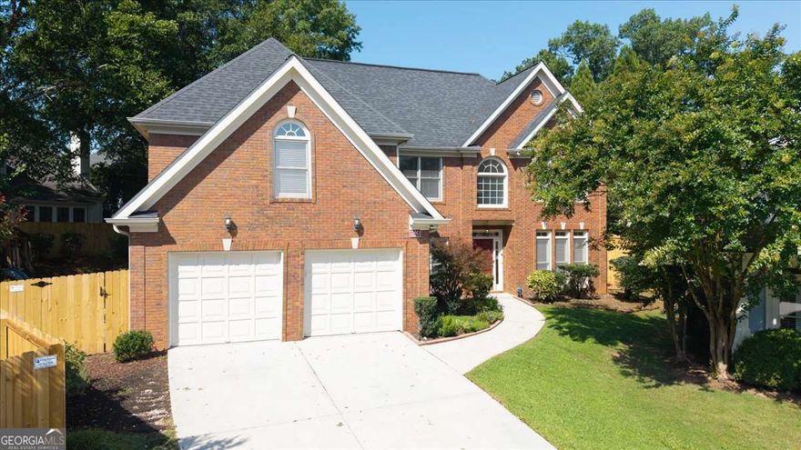 Welcome to 1560 Oak Park Cove, a hidden gem in one of Decatur's most beloved pockets, where community charm meets commuter convenience. Tucked inside a quiet cul-de-sac in the sought-after Oak Grove Elementary district, this home offers the rare balance of peaceful suburban living with effortless access to Emory, CHOA, the CDC, and all the vibrant energy along the LaVista/Oak Grove corridor. Imagine morning walks along the new constructed tree line sidewalk to Oak Grove Market - a true local favorite with a full-service butcher, cozy cafe, and convenient everyday essentials. Spend weekends enjoying DeKalb Tennis Center in Mason Mill Park, one of the area's top-rated tennis and pickleball facilities offering 17 courts, private lessons, year-round league play, and tournaments. Recreationally, Lullwater Preserve, Medlock Park and Clyde Shepherd Nature Preserve are nearby. Additionally several swim, tennis and social clubs are in the neighborhood including Leafmore, Pangborn, Twin Lakes and Briarwoods Beach. You're minutes from the shops and dining at Toco Hills, and only a short drive to Downtown Decatur, where you'll discover an amazing mix of local restaurants, farmer's markets, breweries, and community events in a charming small-town setting. Also nearby are two popular charter schools; Coralwood School and The Globe Academy - making this location even more appealing to buyers seeking strong educational options close to home. When it's time to venture into the city, you're just a short hop to I-85, GA400, I-285, and East Lake MARTA, placing Buckhead, Midtown, Downtown within easy reach. Inside, 3,500 square feet of light-filled living space offers exceptional flexibility for today's lifestyle needs. The main level showcases hardwood floors throughout, with an elegant living and dining space anchored by crown molding, a tray ceiling, and updated lighting. The kitchen is both beautiful and functional with stainless steel appliances, double ovens, bar seating, pendant lights, and an eat-in breakfast area that opens into a spacious great room featuring vaulted ceilings and cozy fireplace. Main-level bedroom and full bath provide convenience for guests or multi-generational living, while a separate dedicated office offers the perfect spot for remote work, play, or creative pursuits. Upstairs, you'll find three generously sized bedrooms and a spacious hall bath, a large bonus room offering even more flexible space, along with an oversized primary suite featuring a walk-in closet with California Closets-style organizers, a jetted soaking tub, his & her vanities, and a separate glass shower. Step outside to enjoy the largest lot in the neighborhood - a fully fenced, private backyard oasis with mature landscaping, a flagstone patio, fruit-bearing trees (apple, fig, and peach), a play area, and a private gate offering direct access to LaVista Road and the Oak Grove retail district featuring several bars and restaurants and the Oak Grove Market. Whether you're relaxing, entertaining, or gardening, this outdoor space is a true retreat. With its flexible floor plan, unmatched lot size, and walkable location in one of Decatur's most desirable communities, this home is a rare find.