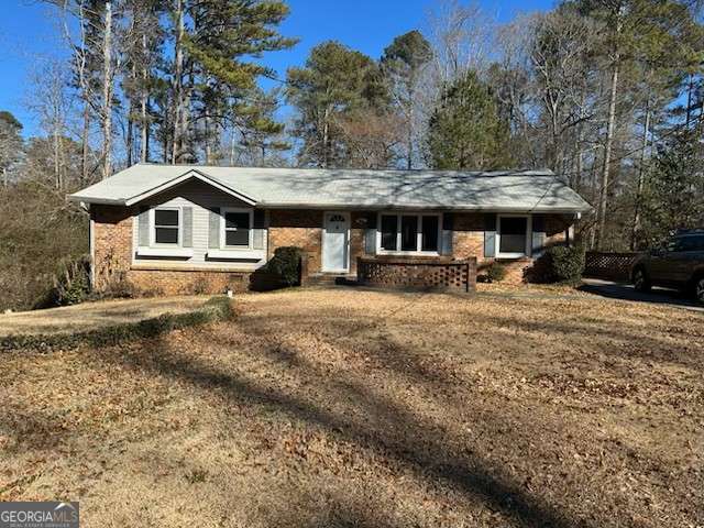 Beautiful 3 bedroom 2 bath, 4 sided brick ranch. Completely renovated. LVP flooring throughout. New appliances and water heater. Close to EW Connector, schools, shoppin. No HOA! Book your showing today.