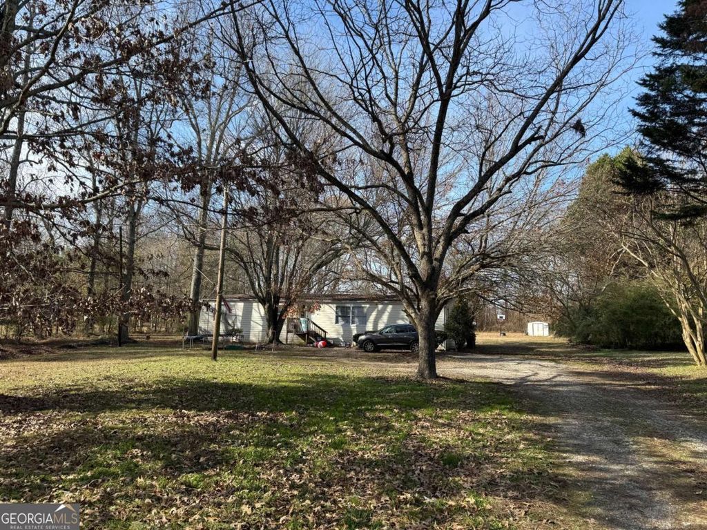 Photo of 305 Brand Road SW, Loganville, GA 30052 (MLS # 10659447)