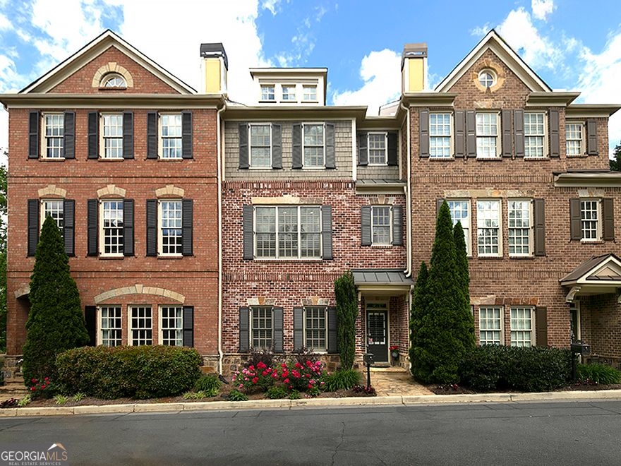 This beautifully maintained 3 bedroom, 3.5 bathroom townhome offers the perfect blend of comfort, convenience and modern upgrades. Located just moments from the vibrant Marietta Square and scenic Kennesaw Mountain, it's an ideal location for those seeking easy access to shopping, dining, and outdoor recreation. Cozy up by the fireplace in the great room with coffered ceiling and built in bookcases adjacent to the formal dining room with tray ceiling. The spacious kitchen offers granite countertops, microwave, stove, undermount lighting and large breakfast area-perfect for home cooks and entertainers alike. Step outside to a deck with a retractable awning, ideal for relaxing or entertaining guests. The owner's suite is a true retreat with separate sitting room, professional closet installation, and luxurious bath with quartz countertops. A second bedroom and full bath on the same level offers privacy and convenience for family or guests.  The terrace level features a third bedroom or flexible space with adjacent tiled bath and access to large garage with professionally coated floor and large storage room. The HOA covers roof and gutter replacement, exterior painting, landscaping, termite control and water-making homeownership a breeze,  Bonus! Seller will contribute $5000 toward buyer's closing costs with an acceptable offer.  Don't miss out on this rare opportunity to live in one of Marietta's most desirable locations!