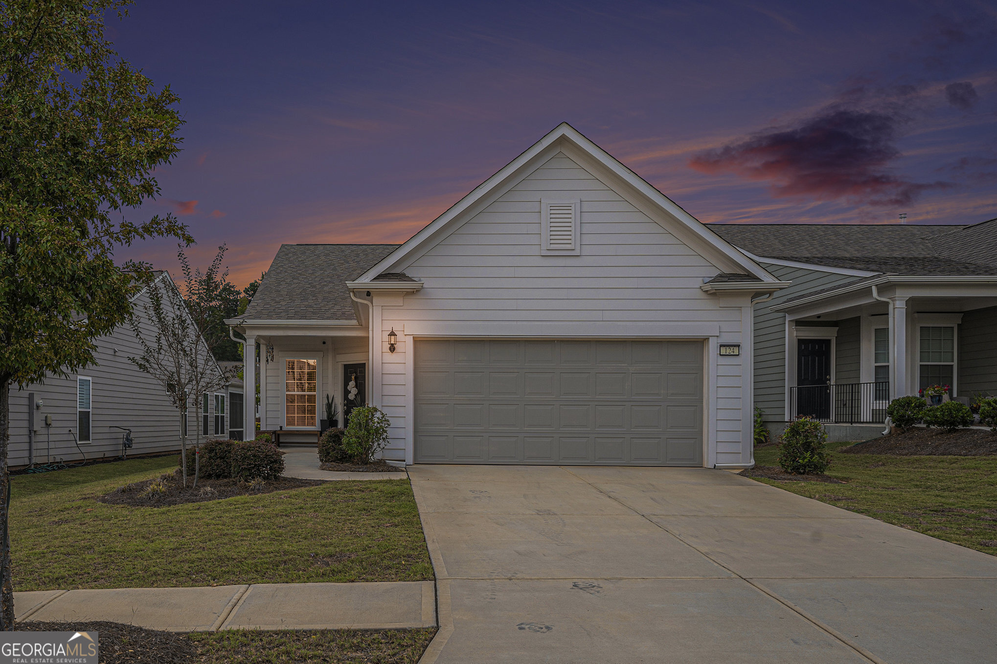 Discover the ultimate in resort-style living at Sun City Peachtree! Located in one of the premier 55+ gated communities, this meticulously cared-for home, built in 2022, combines the best of modern luxury and everyday comfort. A rare gem, this one-story home features an open floor plan with top-tier upgrades throughout. The chef-inspired kitchen stands out with its expansive island, stunning quartz countertops, soft-close cabinetry, and convenient pull-out shelves for effortless organization. Designed with entertainers in mind, it flows smoothly into the spacious dining area and inviting great room, which is bathed in natural light thanks to large windows. Enjoy the flexibility of choosing between gas or electric appliances, thanks to the natural gas hookup. Adjacent to the kitchen, the versatile flex room offers a wealth of possibilities-perfect for a casual breakfast nook, a quiet home office, or additional seating space. Throughout the main living areas, wide-plank hardwood floors add warmth and style, while the bedrooms feature plush carpeting, and the bathrooms boast elegant ceramic tiles, offering a perfect mix of modern design and comfort. The generous primary suite is a true retreat, complete with a luxurious en-suite bath featuring a double vanity, a tiled walk-in shower, and a soaking tub. A spacious walk-in closet offers plenty of room for storage and organization. The light-filled second bedroom, with its own double closet, is just steps from the beautifully appointed second bathroom, making it ideal for guests. Outdoor living is just as impressive, with a covered front porch providing a peaceful retreat and a partially covered back patio that spans the full length of the home-perfect for both sunbathing and enjoying the shade. Step outside and experience the world-class amenities of Sun City Peachtree. From indoor and outdoor pools to tennis courts, pickleball, bocce ball, a well-equipped fitness center, and scenic walking trails, there's no shortage of activities to enjoy. This vibrant, low-maintenance community offers an active lifestyle tailored to your every need.