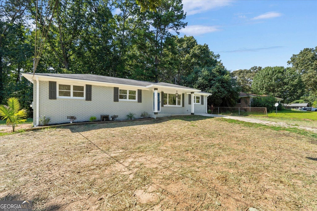 Photo of 6963 Debbie Lane, Lithia Springs, GA 30122 (MLS # 10851967)