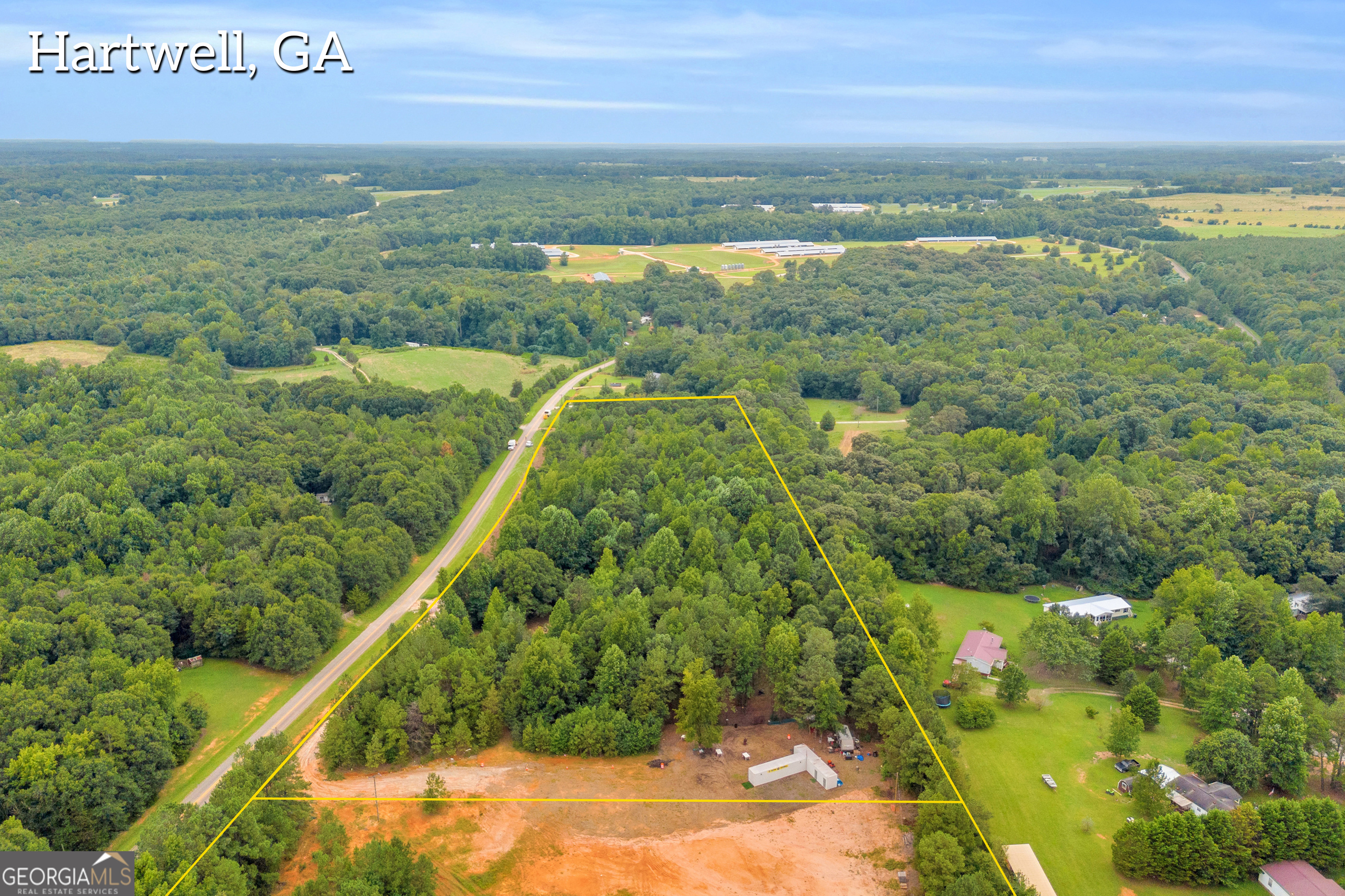 This 9-acre lot offers exceptional potential for development with access to public water and 355 feet of paved road frontage. The property's size and layout provide ample flexibility for a wide range of uses, whether residential or commercial. Convenient road access enhances visibility and accessibility, while the availability of public water reduces infrastructure costs. A rare opportunity to secure a versatile parcel with excellent growth potential.
