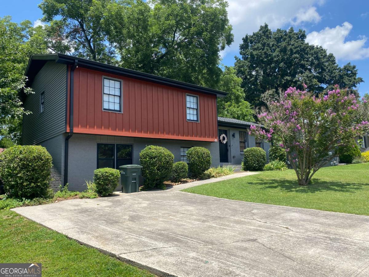 Come and experience the peaceful tranquility this completely renovated late 70's split level gem has to offer. You'll experience the latest finishes found on HGTV. This 1,870sf+ 4 Bedroom/3 Bath home is nestled only 4 blocks from beautiful Marietta Square. Gorgeous Covered Porch with large fenced back yard. Gather your family & friends to enjoy this relaxing haven just a short drive to Braves Stadium, Six Flags White Water, Midtown & Down Town Atlanta. Kids Elizabeth Porter Park is a 5 min walk. The open floor plan concept is perfect for entertaining large families and friends. *There is a relaxing Terrace Level perfect to nestle into a reclining sofas for movie night,also a great spot for a game room! *There is also a gorgeous queen suite and common bathroom on the Terrace level. *Upstairs you'll find the Master En Suite with king size bed. *Bedroom 3 boasts another gorgeous queen suite *Bedroom 4 is perfect for kids with a bunk bed with twin on top and full bed below. *Spa like bathrooms. *Beautiful private fenced back yard *Serene Covered Porch perfect for relaxing or dining. So close to Marietta Square where you'll find great food and entertainment!