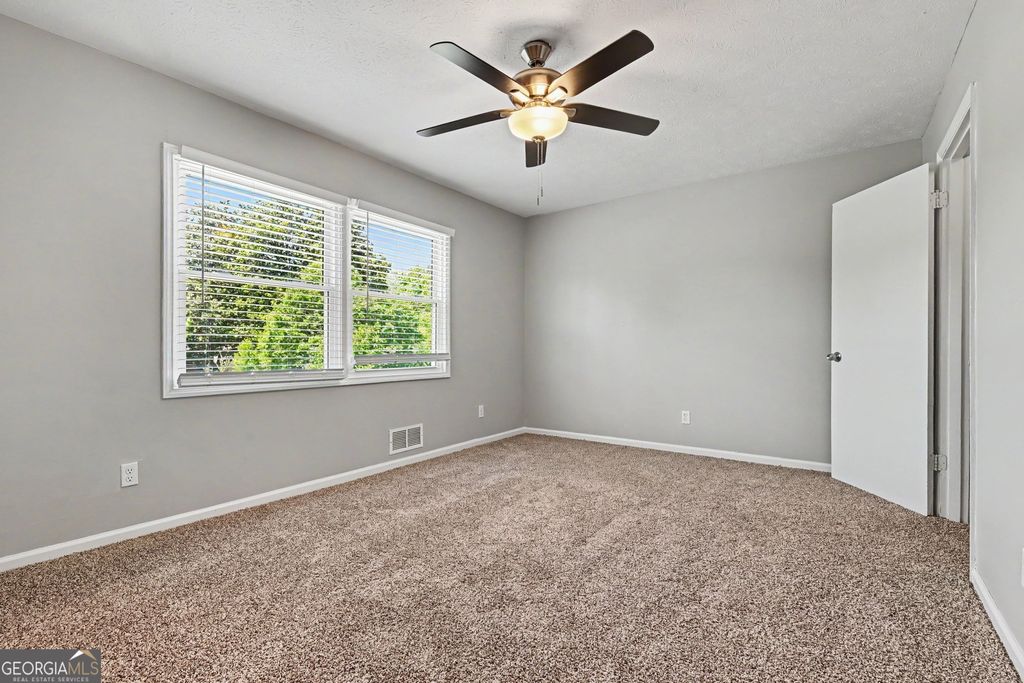 Photo of 2130 Sandgate Circle SW, Atlanta, GA 30349 (MLS # 10767879)