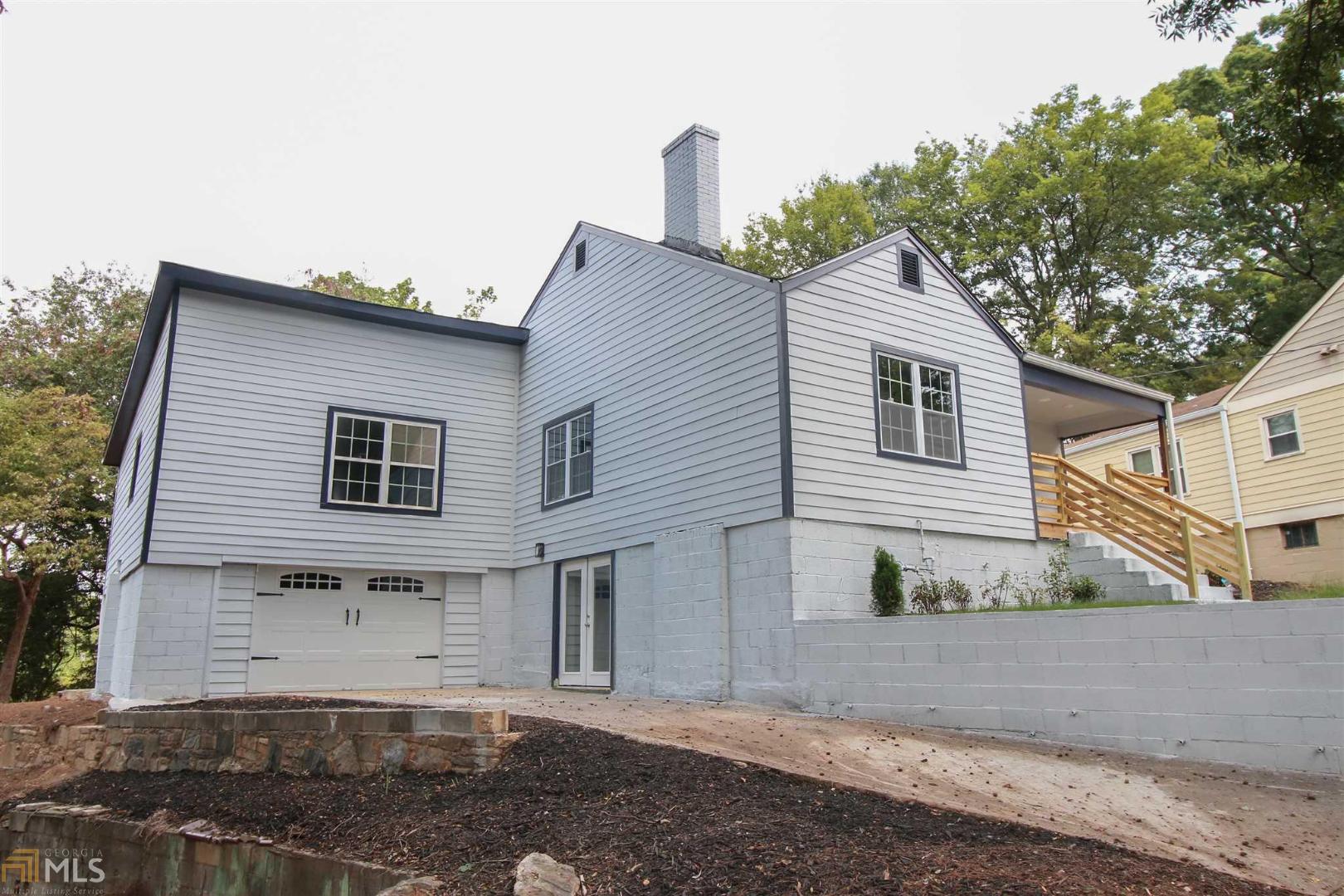 Beautiful home in Washington Park fully remodeled with all new systems and a fully finished basement. Also it has on the few garage's in the city with plenty of parking with a long driveway. The home is larger than it looks with living room, family room, 2 eating spaces and a large family room in basement. The house is right next to park with a direct path from house. The community has a public pool and tennis center available. The house is very close to beltline and less than 2 miles from the Mercedies Benz stadium and Georgia Aquarium. The house is virtually staged.
