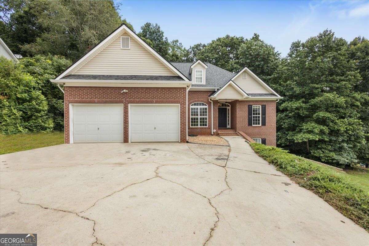 The location at 160 Amidon Drive, Villa Rica, GA, offers an exceptional opportunity for families and multi-generational living in a beautifully designed brick-front home. With a fully finished basement, this expansive residence features a primary suite on the main level, along with two additional bedrooms and a full bathroom-perfect for everyday comfort and functionality. Downstairs, the thoughtfully designed basement includes three spacious bedrooms, another full bathroom, and a versatile office or gym space-ideal for working from home or staying active. A standout feature of this home is the basement's stylish and unique bathroom, offering an elevated experience for guests or in-laws and ensuring privacy and ease for extended stays. The separate entrance leading directly into the basement enhances the layout's flexibility, making it an excellent setup for extended families, multi-gen households, or anyone desiring additional private living space. Convenience is key at this address-just 8 minutes from I-20, offering quick access to Atlanta and nearby cities. Residents are also just 7 minutes from Mirror Lake's shopping and dining options, 12 minutes from the New Georgia retail centers, and only 15 minutes from Villa Rica's Super Walmart-ensuring everyday essentials are always within easy reach. Combining space, comfort, and a highly functional layout with a prime location, 160 Amidon Drive is a rare find-offering the perfect blend of modern living, flexibility, and suburban charm.