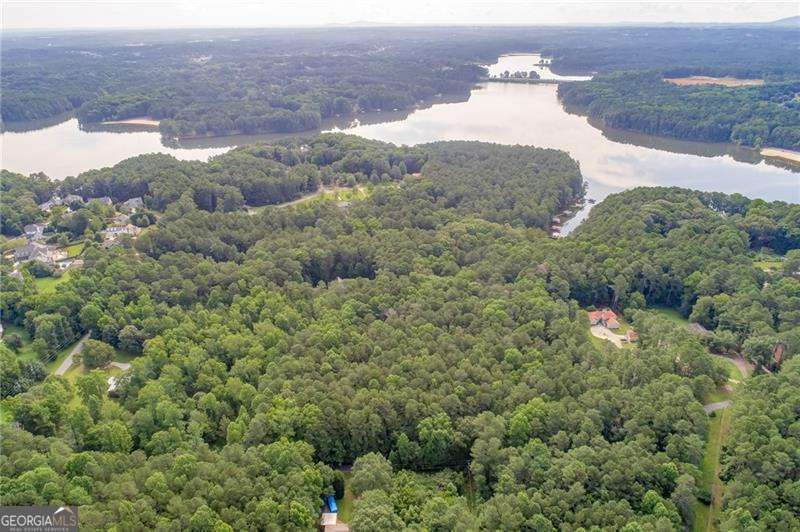 GREAT OPPORTUNITY TO BUILD YOUR DREAM HOME/ESTATE. ENDLESS OPTIONS WITH THIS 2.70 ACRE LEVEL LOT. BACKS UP TO CORP OF ENGINEERS PROERTY BORDRING LAKE ALLATOONA. GREAT LOCATION IN A QUIET NEIGHTBORHOOD, CLOSE TO SHOPPING, RESTAURANTS AND THE LAKE, ETC