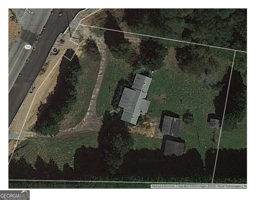 Photo of 8930 Highway 54, Jonesboro, GA 30238 (MLS # 10675048)