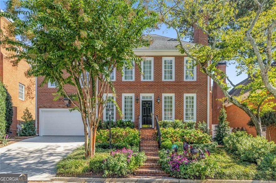 Absolutely stunning, this all-brick traditional home is nestled in the quiet, sought-after Village at Lenox Park-perfectly positioned between Buckhead and central Brookhaven. Fully renovated by one of Atlanta's top designers, every detail has been thoughtfully curated for comfort and style.  Step inside to a welcoming two-story foyer and discover hardwood floors, ten-foot ceilings, and plantation shutters throughout the main level. The spacious living room features a cozy gas fireplace and mantel, while the elegant dining room offers a picturesque bay window view of the professionally landscaped, walled, and gated backyard and patio. The chef's kitchen is a true showpiece, boasting granite counters, custom cabinetry, a beverage center, double ovens, warming drawer, farmhouse sink, and premium Wolf and Sub-Zero appliances. A formal powder room and extra storage complete the first floor.  Upstairs, the open staircase with luxurious wool carpeting leads to a generous master suite with a large walk-in closet, abundant natural light, and a spa-inspired bath with soaring ceilings, double vanities, a freestanding tub, and a lavish shower. Two oversized secondary bedrooms feature ample closet space and share another beautifully renovated full bath. The laundry is conveniently located upstairs.  Enjoy outdoor living in the fully irrigated, professionally landscaped backyard with a large brick patio and a handy storage building. The spacious two-car-plus garage is professionally sealed, offers plenty of storage, and features automatic doors. This is a true turnkey opportunity-meticulously cared for, inspected, and serviced, ready for you to move in and enjoy.