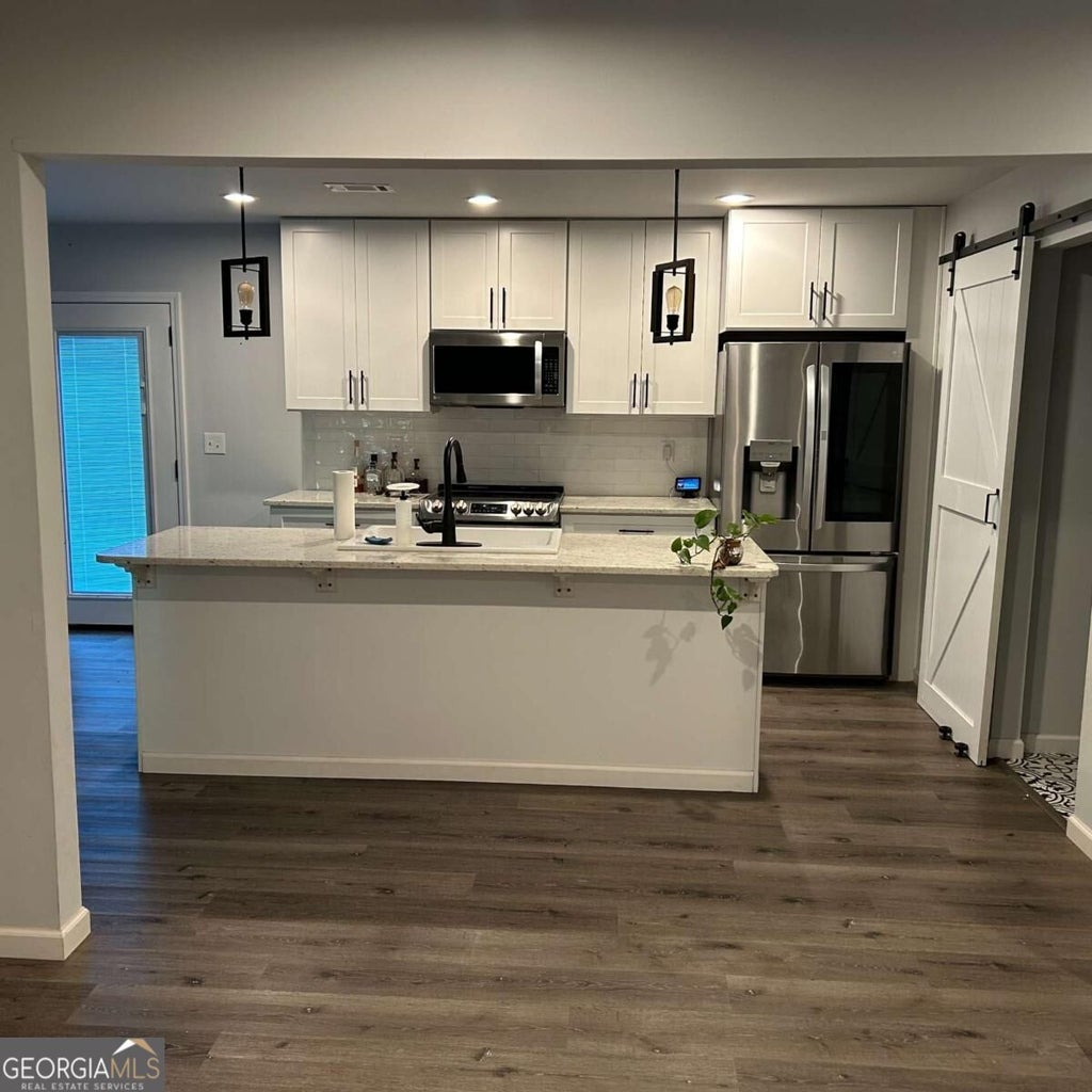 Photo of 2210 Chaparral Drive, Snellville, GA 30078 (MLS # 10852903)