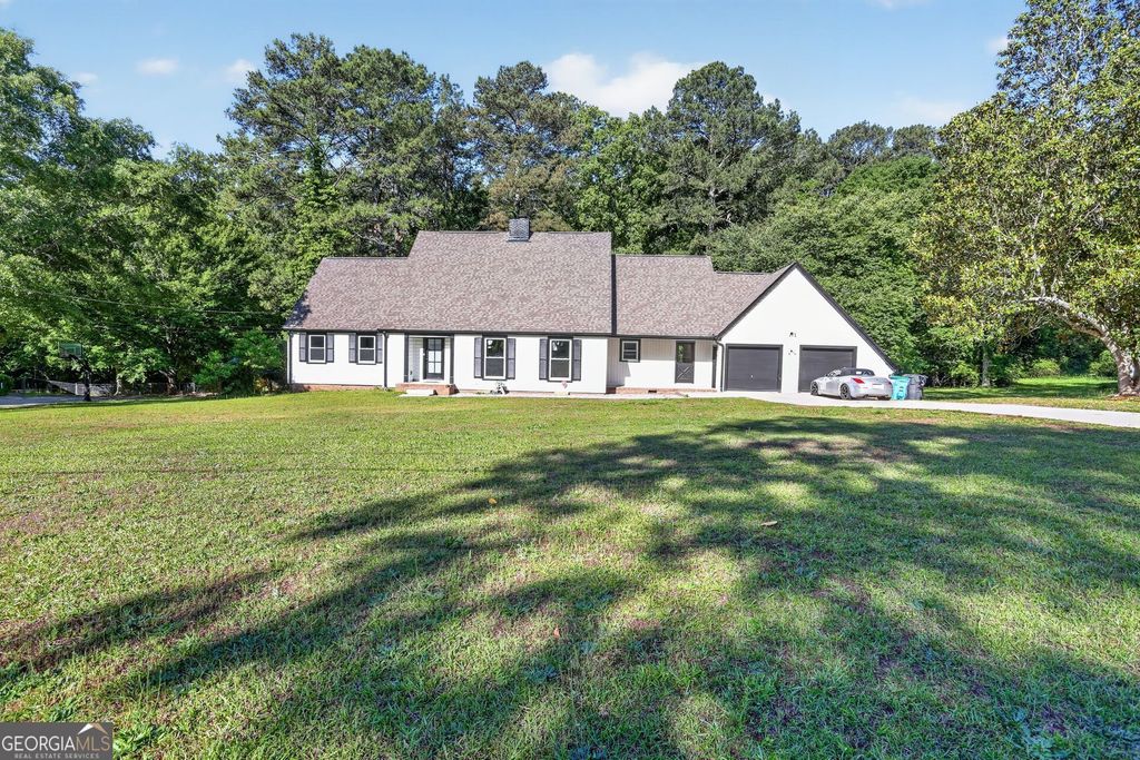 Photo of 2223 Angela Drive SW, Lilburn, GA 30047 (MLS # 10767129)