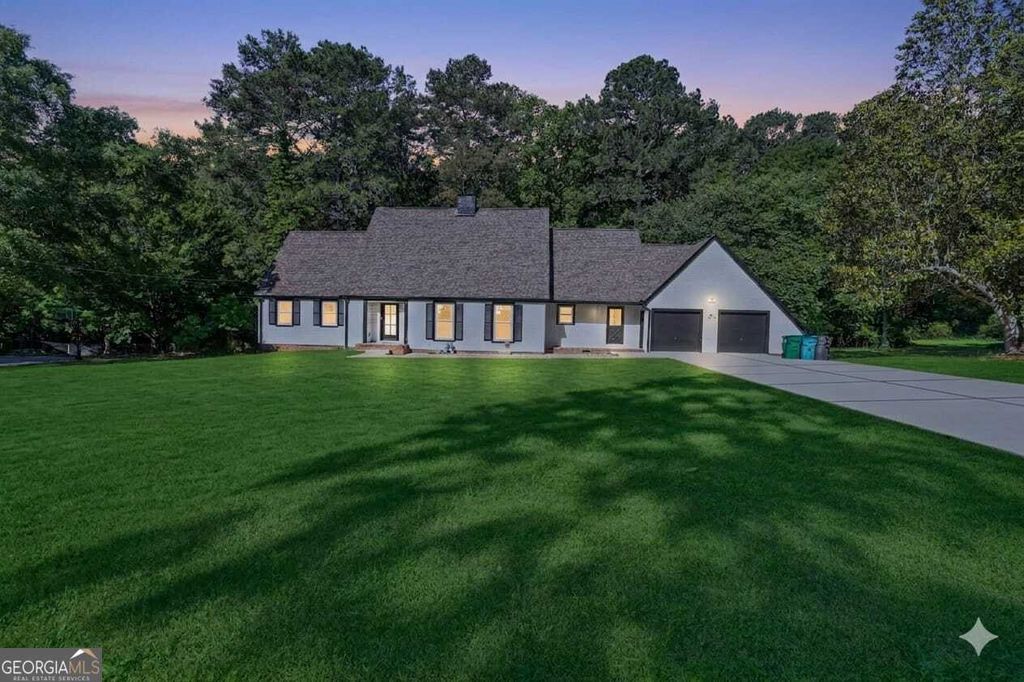 Photo of 2223 Angela Drive SW, Lilburn, GA 30047 (MLS # 10767129)