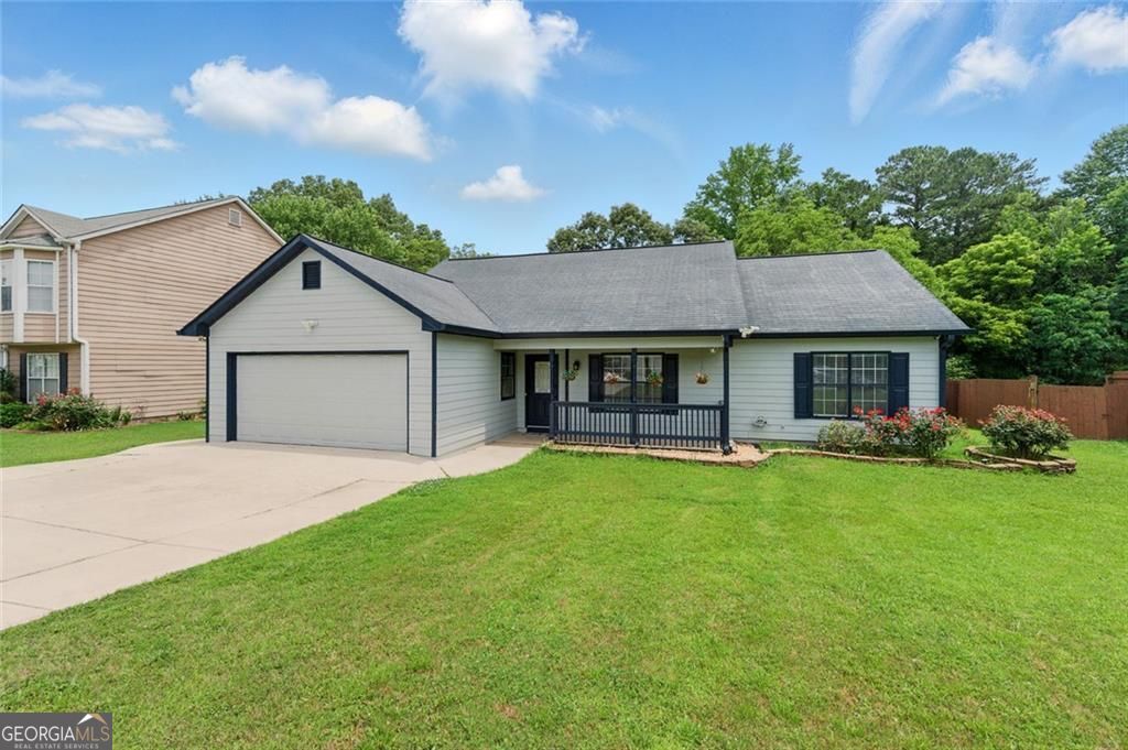 Updated ranch-style home nestled in a quiet, no-HOA neighborhood! This home truly has it all - including a spacious fenced backyard with a small pool, perfect for relaxing or entertaining! Step inside and be greeted by an abundance of natural light, fresh paint throughout, and a warm, inviting layout. The chef's kitchen features stained cabinetry and a cozy breakfast area. A separate in-law suite complete with its own kitchenette and dining space - perfect for guests, extended family, or more! This flexible layout offers endless possibilities - perfect for a single-family residence or a multi-generational household. Whether you're looking to live in the main home and use the in-law suite for guests or generate additional rental income, this property has you covered. Located just minutes from Downtown Lawrenceville, Rhodes Jordan Park, University Parkway, shopping, dining, and entertainment, you'll enjoy both comfort and convenience in one great package!