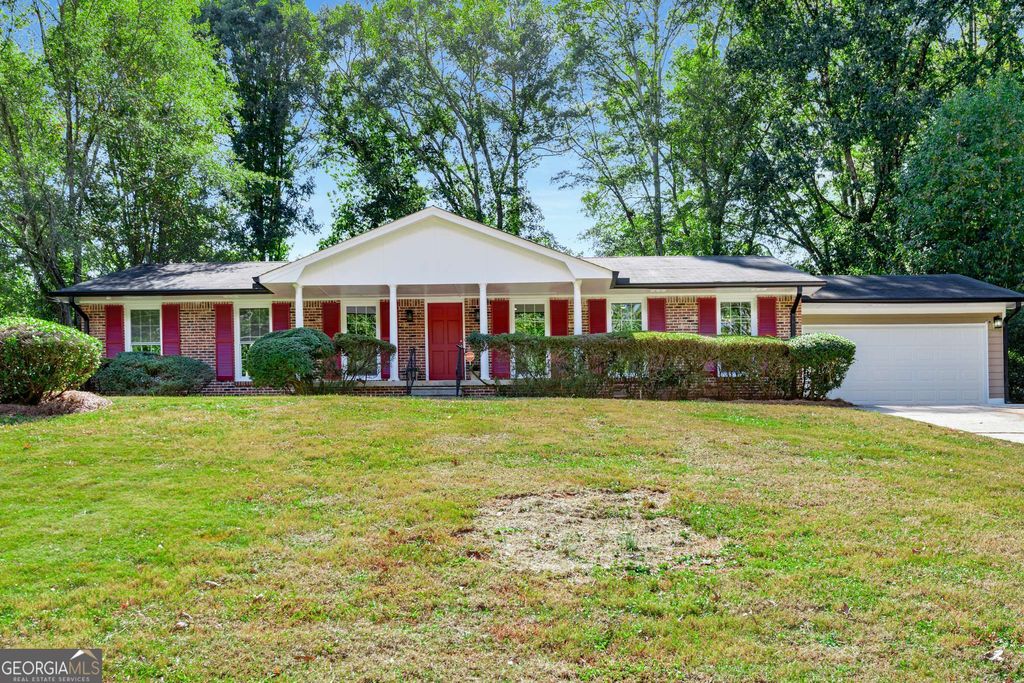 Photo of 4889 Fairforest Drive, Stone Mountain, GA 30088 (MLS # 10631911)