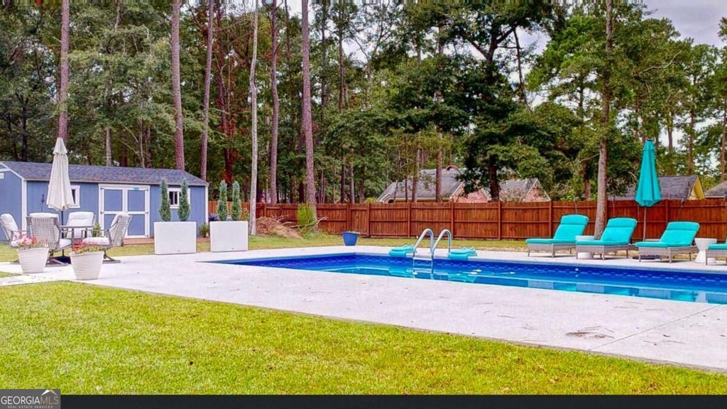 Photo of 129 Palmetto Drive, Rincon, GA 31326 (MLS # 10846601)