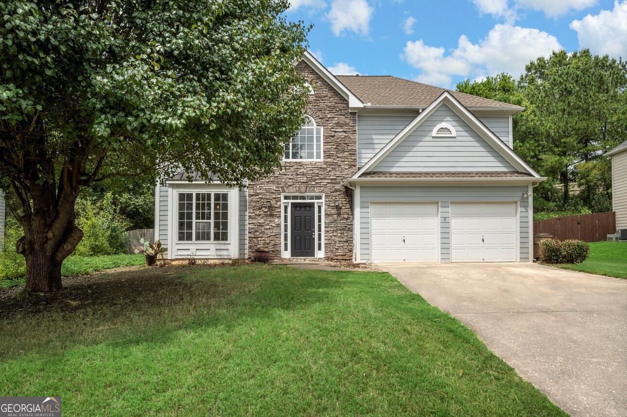 Welcome to this charming 4-bedroom, 2.5-bath home located in the highly desirable Chadbourne neighborhood, known for its family-friendly atmosphere and top-rated Forsyth County schools. Enjoy the benefits of a low HOA with access to resort-style amenities including a pool, tennis courts, and playground. The home features a freshly painted interior throughout, all carpets areas have been cleaned and sanitized, a spacious backyard perfect for entertaining or play, and an ideal location just minutes from GA-400, Halcyon, and the Greenway. With the newly proposed Gathering at South Forsyth development nearby, future shopping, dining, and entertainment will be right at your doorstep. This is the perfect combination of comfort, convenience, and community living don't miss your chance to call it home!