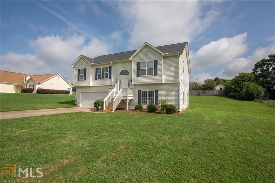 Must see newly renovated home located just mins off Hwy 316 within close proximity to shopping. Spacious 3BR with 2BA and bonus room (not included in the SQFT). Kitchen has many updates you must see: NEW cabinets, granite counters, stainless steel appliances, backsplash, flooring. BA's also have NEW cabinets, granite, plumbing fixtures, etc. Master BA has deluxe tub and separate shower. BR's have huge closets, including a walk-in master. The home has new interior paint and flooring. Vaulted ceilings in the family room complete the look. Will not disappoint!