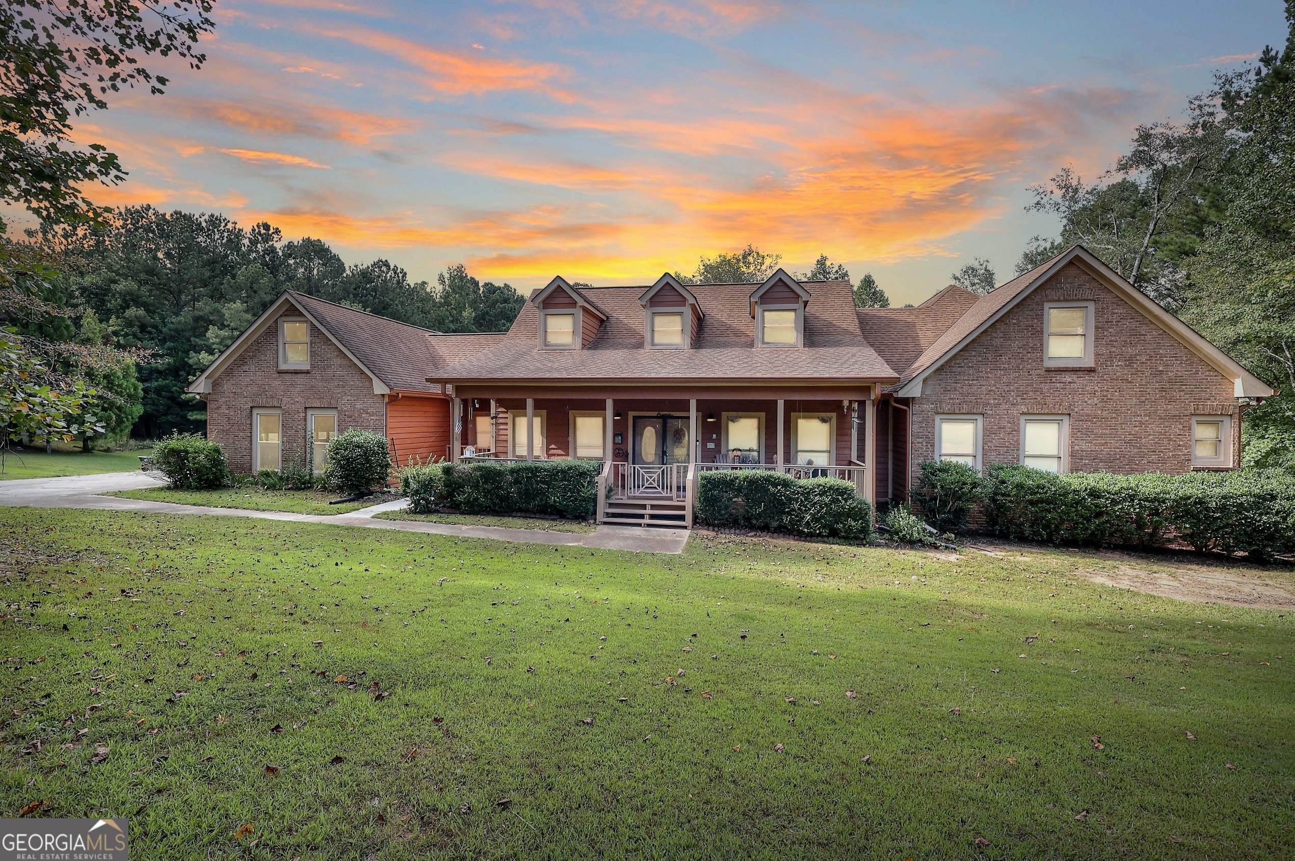 Abundance of space in this 4,300+ square foot home with unfinished basement, large workshop and shared pond on 5+ acres in Newborn! 4 bedrooms, 4.5 bathrooms, with an office and additional bonus room upstairs that could be a 5th bedroom! Formal dining room and island in kitchen with built ins and picture window. Utility room off kitchen with access from garage for ample storage. Large brick fireplaces in living room and primary bedroom. Watch the deer from the oversized deck overlooking the lake with screened porch, accessible from primary suite. Additional garage/workshop in basement. Fiber internet available!
