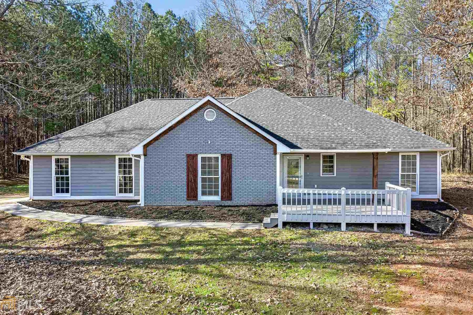 Beautiful Locust Grove Renovation. This charming brick accented ranch is nestled in the middle of a 1.4 acre cul-de-sac lot. The exterior is highlighted with stained wood features, including barn style shutters. The interior renovations include shiplap fireplace with custom floating shelf, wood grained luxury vinyl plank flooring, new carpeting and new paint throughout. The kitchen features granite countertops, brand new stainless steel appliances and new pendant light fixtures. The backyard has two storage outbuildings and the driveway includes parking shed! Quiet one street neighborhood, country living at its best! USDA 100% financing eligible!