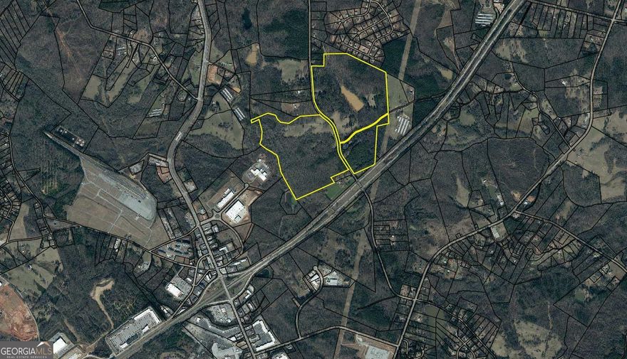 Property is located within a mile of the hub of Banks County and in line for future expansion of Industrial/ Commercial use, but may be developed into residential with the addition of upgrades to the public sewer system. Property is approx. 3/4 open pasture, with good topo.  The property is fenced and cross-fenced and has livestock in place.