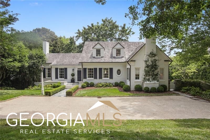 Charming Haynes Manor home on coveted and revered Peachtree Battle Avenue. Beautifully renovated by Stan Dixon, this home offers several living spaces, ideal for entertaining. Entrance foyer leads to living room with fireplace. Sought-after screened-in porch sits in the back of the house and overlooks the backyard. Gorgeous light filled kitchen opens to the cozy keeping room with built-in bookcases and fireplace. Kitchen also offers island, Wolf and Sub-Zero appliances and separate prep kitchen with plenty of storage. Kitchen opens to the breakfast area with built-in banquette. Two bedrooms on the main include oversized primary suite with large walk-in closet and fireplace with sitting area. Primary bath has dual vanities, tub and separate shower. Upper level staircase leads to 2 bedrooms with ensuite baths and open bonus room, ideal for a playroom or TV room. Finished terrace level features a large living room with fireplace, kitchenette, gym, 2 bedrooms, 2 full baths. Beautiful light filled sunroom with iron windows and doors lead to the level backyard. Basement also has access to the 3 car garage. Pool plan available from LandPlus.