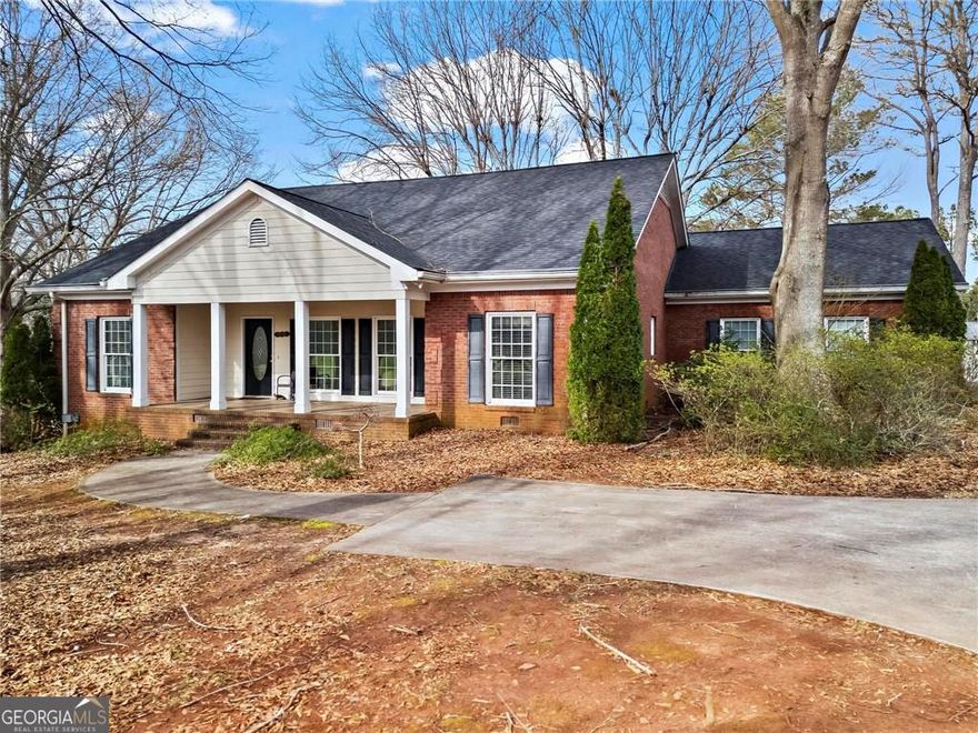 Live Your Country Dream- Minutes from Milton Discover this all- brick ranch-style home on 1.253 with no HOA. Whether you envision chickens in the yard or dogs running around, this property delivers. Inside, enjoy a spacious, light-filled layout with a large kitchen and breakfast nook, formal dining area, cozy family room with fireplace, and a flexible sitting room ideal for an office or reading retreat. The primary suite is tucked away for privacy. A full basement is ready to become your gym, media room, or guest suite, and a newer roof ensures peace of mind for years to come. Mature landscaping offers privacy, and the lot is level perfect for a pool. Best of all, you can walk your children to Summit Hill Elementary and enjoy top-ranked schools just moments away. This is country living with city access----come make it yours.