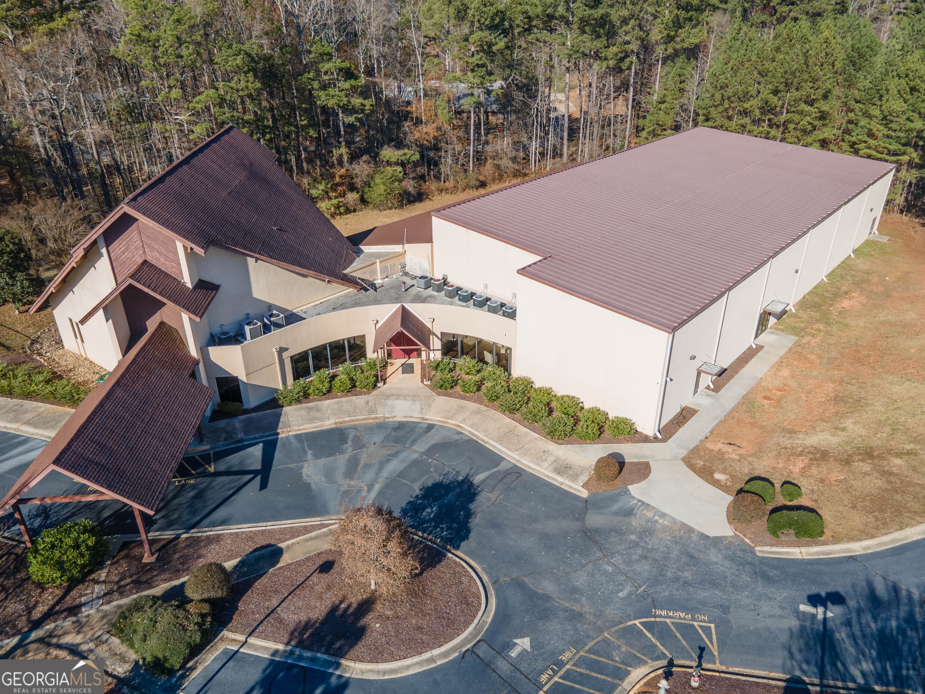 EXTRAORDINARY OPPORTUNITY!  Situated on 18.15 acres this property has been a cornerstone of the community for over 50 years as the Covenant Presdyterian Church of Georgia.  This expansive campus offers a beautiful Church, the rich-detailed sanctuary with balcony, offers seating for over 315 persons, multiple offices, class rooms, baths, kitchens, full finished basement, gym with commercial kitchen encompassing over 20,000 sq. ft. Additionally; there is a  separate mid-century brick ranch, parsonage-home with 3100 sq. ft.,  full basement, in ground pool and lakefrontage.  A covered pavilion with seating for 130+ people, his & hers bath facilities and loads of storage. Tons of parking, childrens playground and a ball field!  This property is perfect for a church, school or community center!  PLEASE DO NOT GO TO THE PROPERTY WITHOUT THE LISTING AGENT. LISTING AGENT MUST BE PRESENT FOR ALL APPOINTMENTS!  Any offers should be in ONE PDF  and accompanied by Proof of Funds. For Additional Information call Dave.